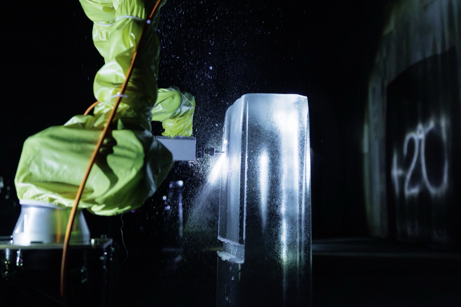 Robot arm milling the ice sculpture