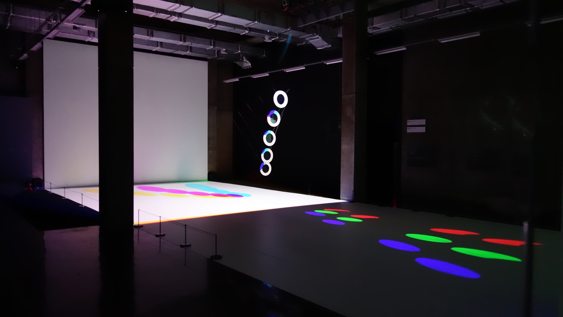 Wide view of RGB light patterns projected on the floor