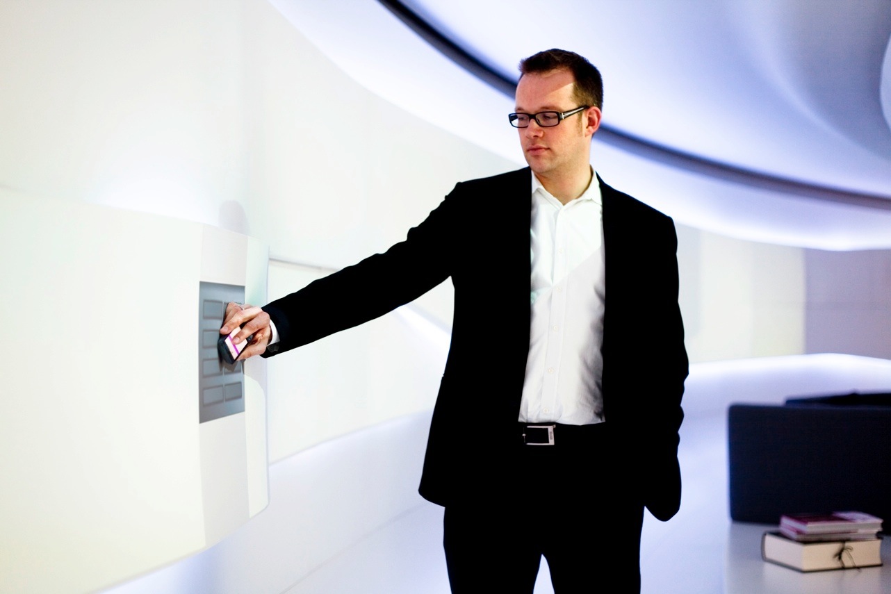 NFC-enabled wall panel interface